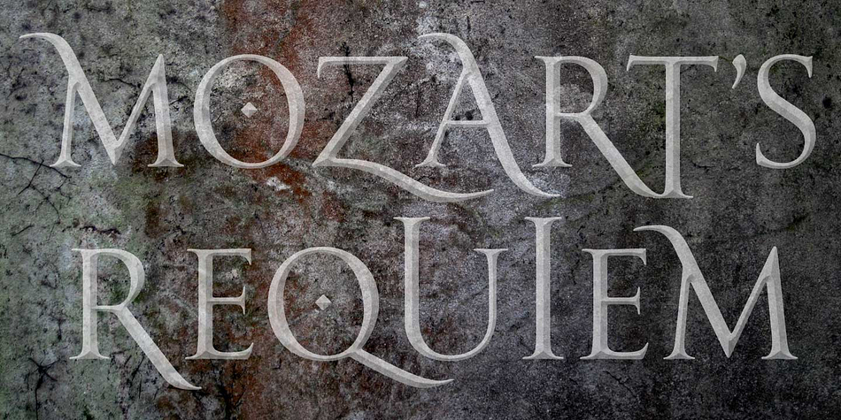 Goudy Trajan Pro font family example.